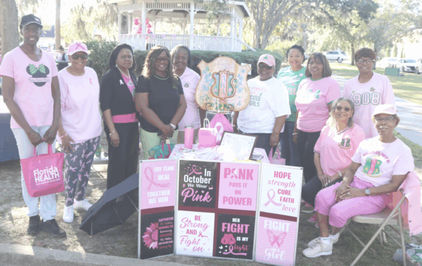 The ladies of the Nu Omega Omega Chapter of Alpha Kappa Alpha Sorority, Inc. were on hand to show support and share valuable information during a breast cancer awareness event at Four Freedoms Park on Thursday, Oct. 16. [Rick Patrick/Greene Publishing, Inc.]