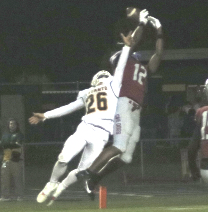Travis Arnold leaps to make a catch during the Cowboys’ win over the Panthers of Lecanto High School on Thursday, Oct. 30. [Rick Patrick/Greene Publishing, Inc.]